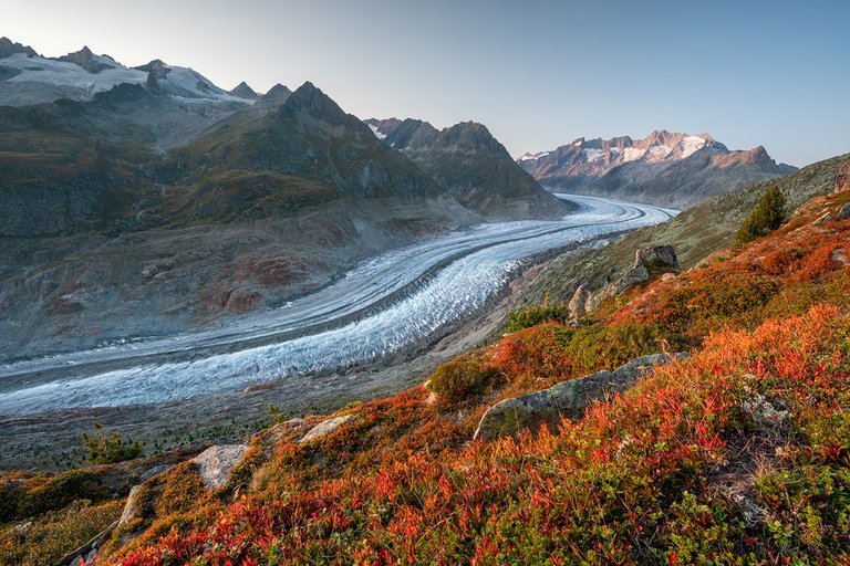 As the last light falls on the mountain range in the background, I shoot this image; The Aletsch Glacier 22 km long, 1.8 km wide, 900 meters thick and 11 billion tons of ice!