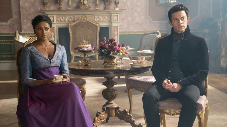 Kate and Anthony discussing in the woods