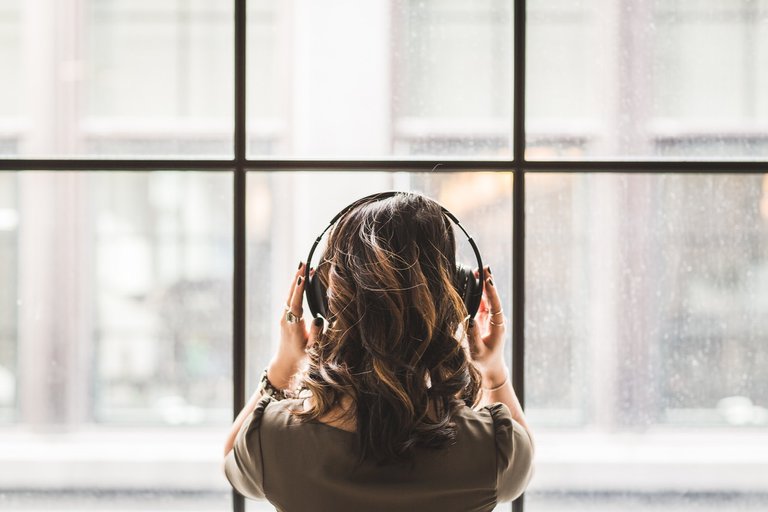 Woman listening with headphones