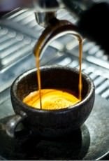 two-espresso-cups-with-saucers-coffee-grounds-1.jpg