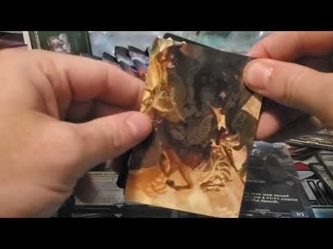 Opening the most disappointing lord of the rings tins ever.