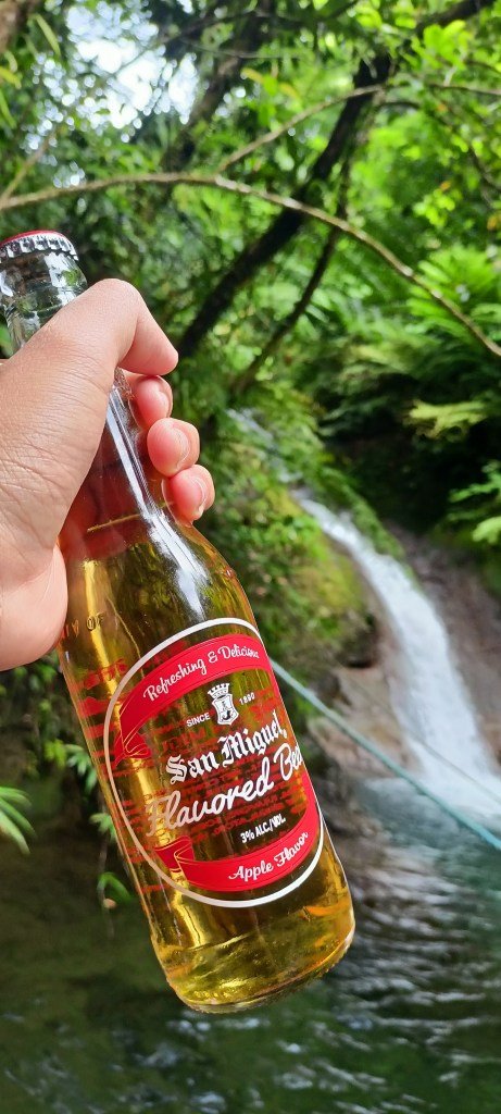  San Miguel Flavored Beer at Pinlac Falls as a background.