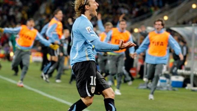 Forlan celebrating the draw's goal