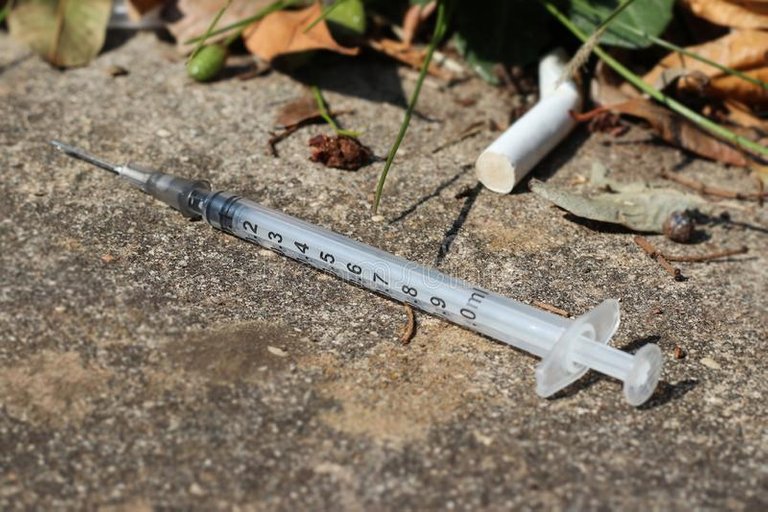 used_discarded_syringe_street_needle_.jpg