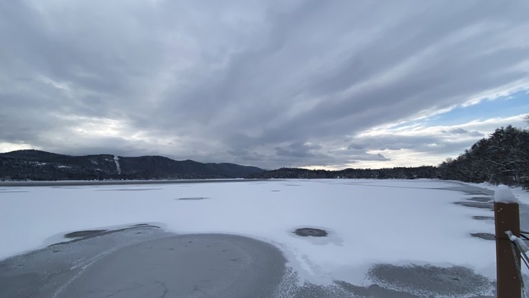 Sunrise over frozen lake