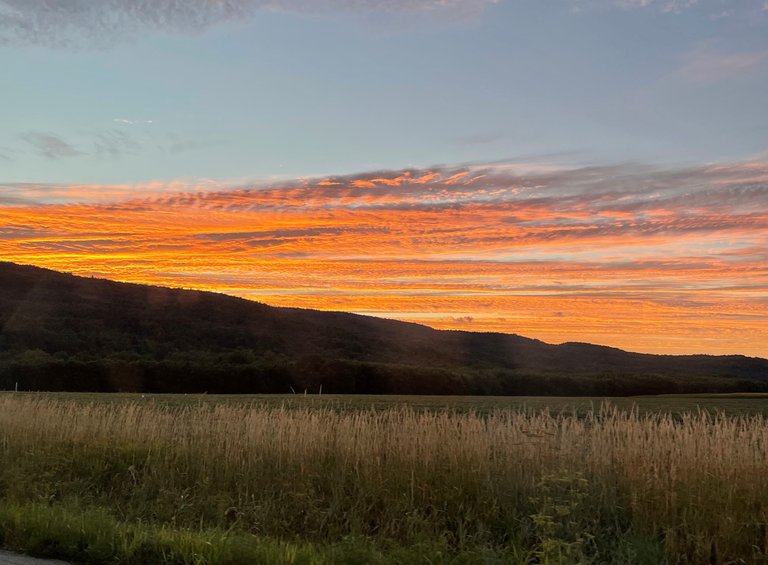 Golden sunset on clouds