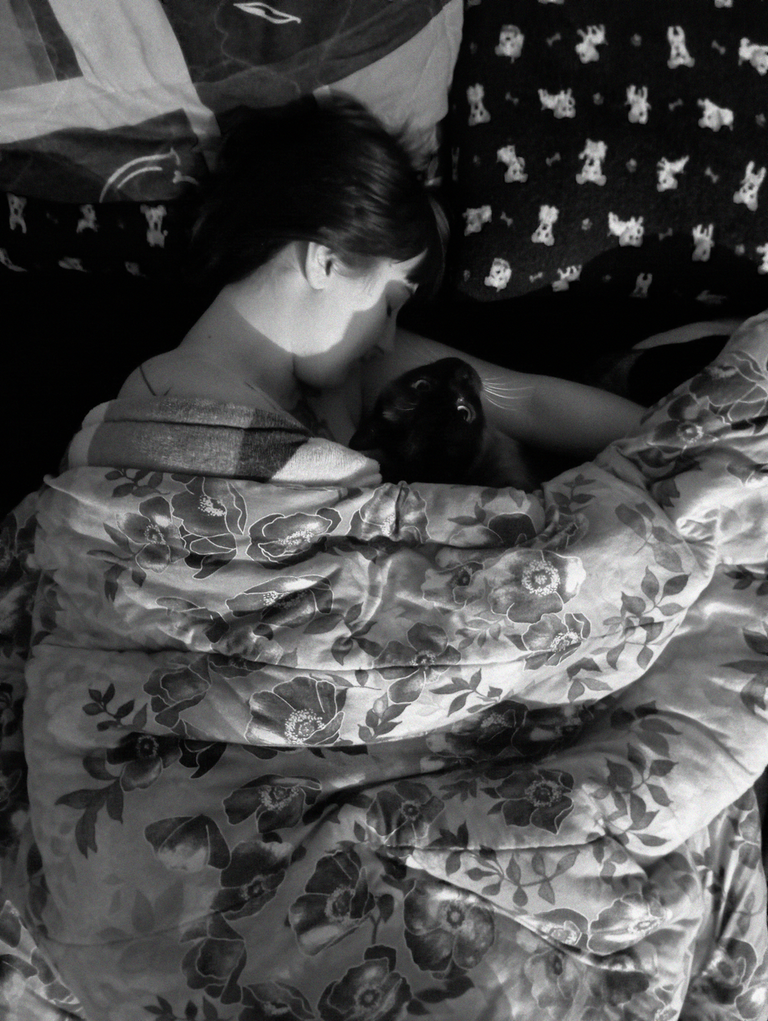 My wife and my cat, on a cold winter night
