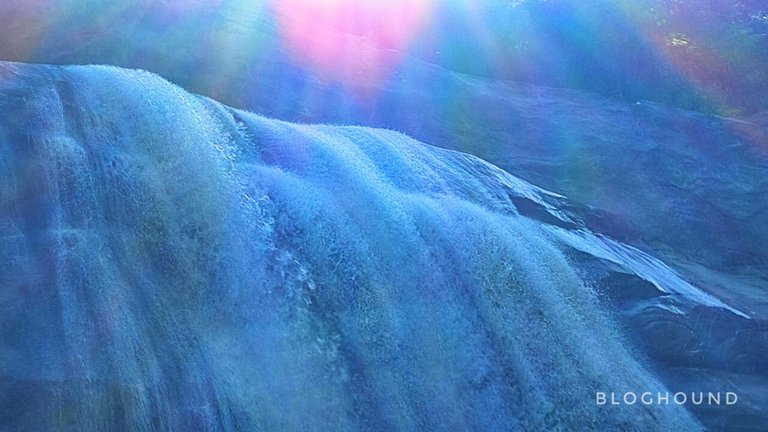 The falls behind that gorgeous sunrise!