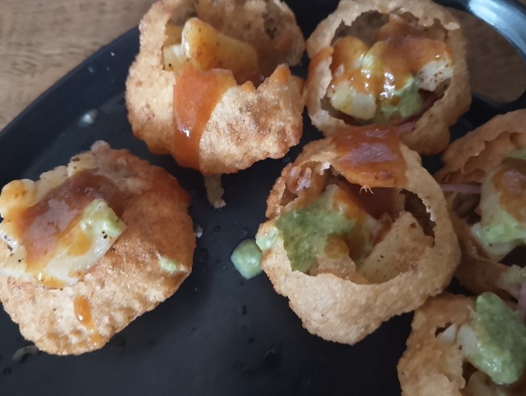 Tasting the Crispy Gol Gappay with Sour- Water
