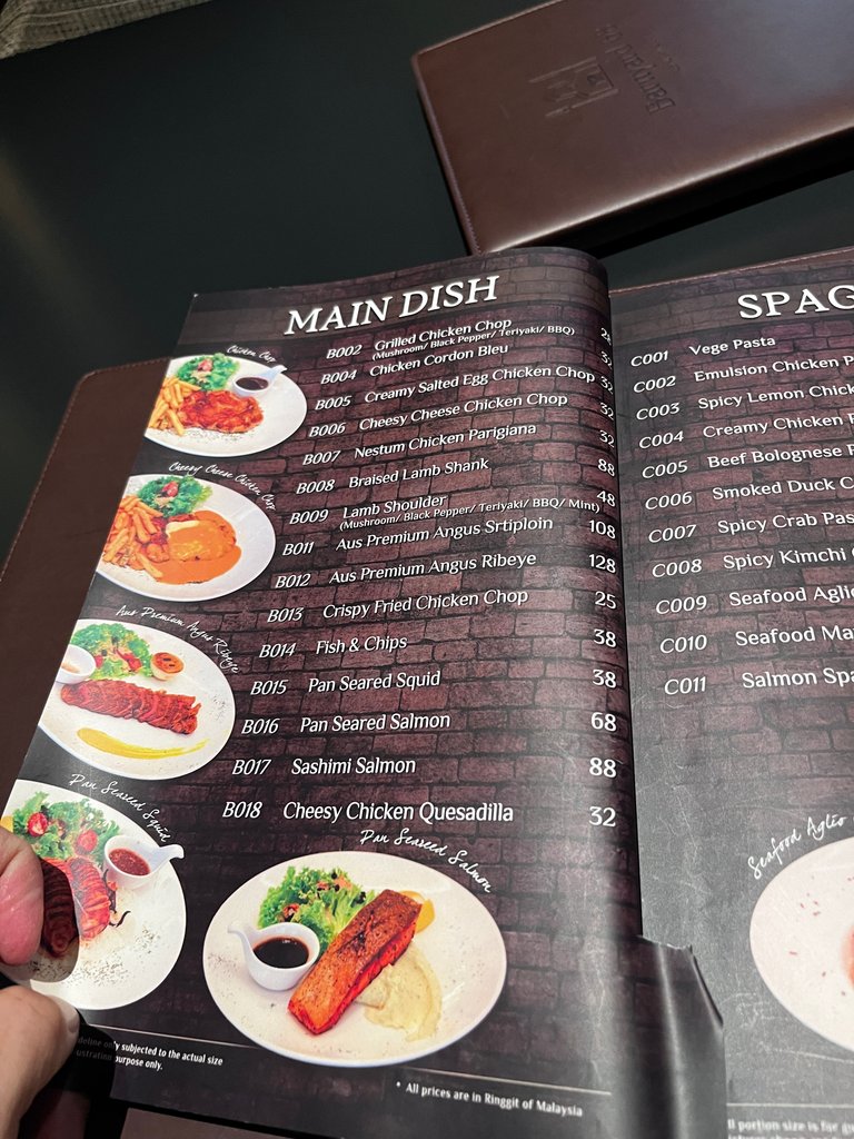 This menu mostly has lots of different types of steaks and chips. The Salmon Steak here looks quite delicious. Griled to perfection. 