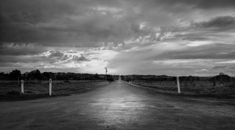 long_and_empty_road_at_sunset_time.jpg