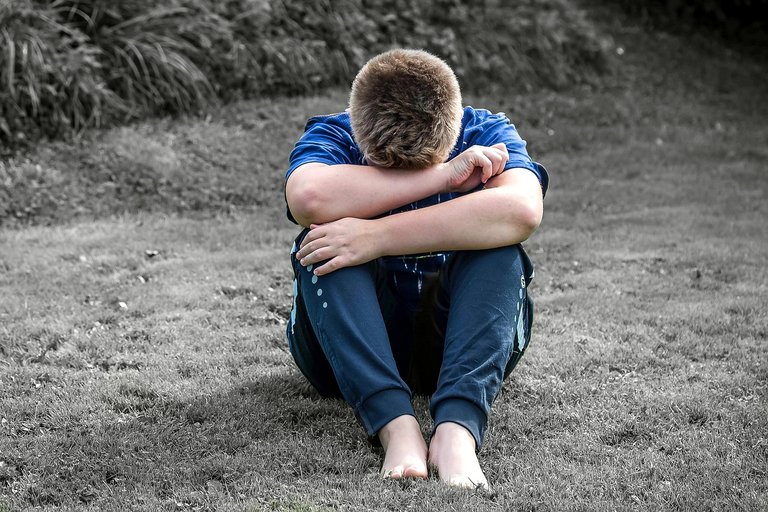 [source](https://pixabay.com/photos/boy-child-sad-alone-to-sit-1666611/)