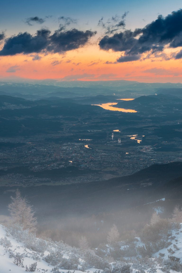 Sunrise View from the Dobratsch Mountain - City of Villach and Lake Woerthersee / Wörthersee