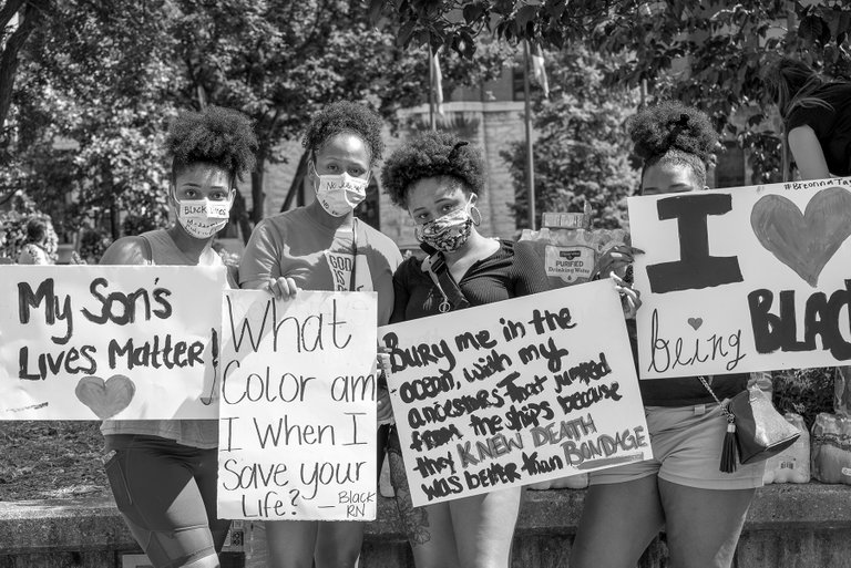 protesters_with_signs_1.jpg