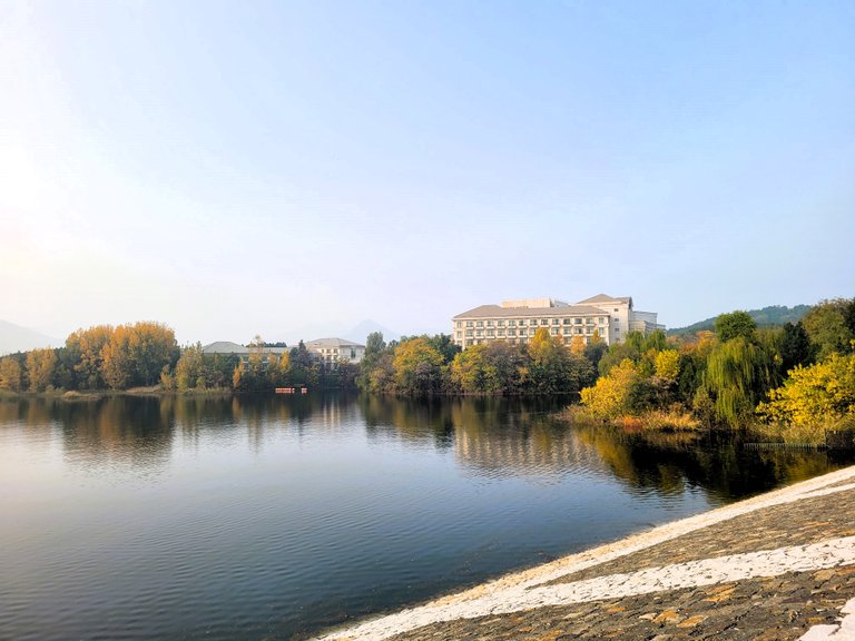 Yanqihu Lake with the Fall Beauty in the Haze