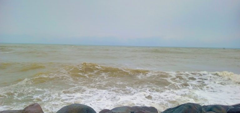 The tanned sea water, mixed with mud, displays a natural charm.