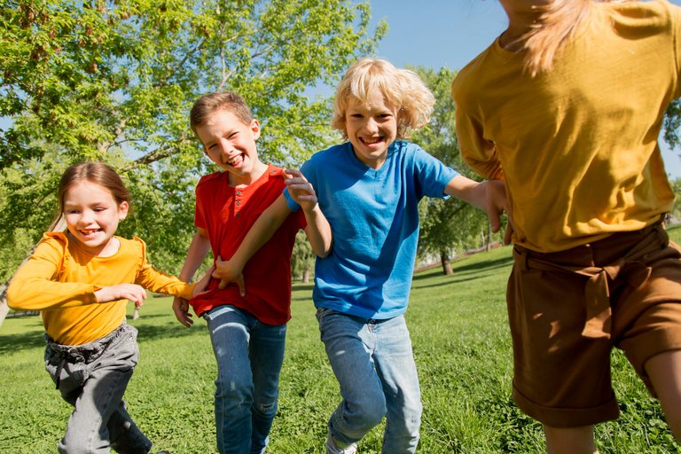 close_up_kids_running_together.jpg