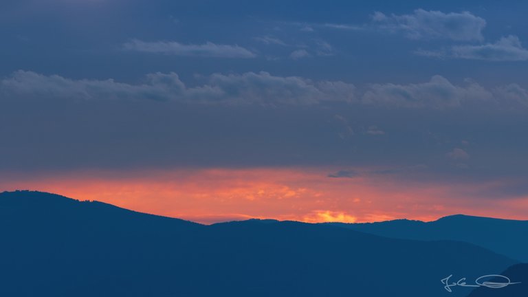 Fire on the Horizon - Sunset at the Sunvillage of Diex