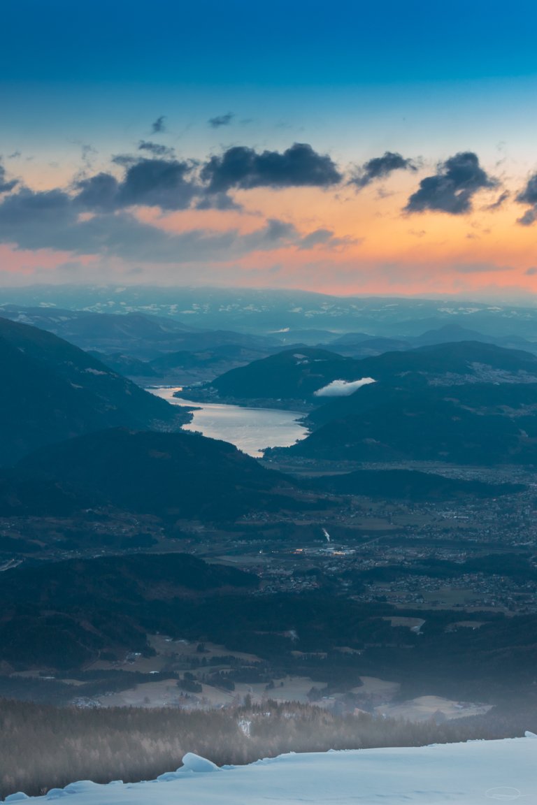 Sunrise View from the Dobratsch Mountain - City of Villach and Lake Ossiach