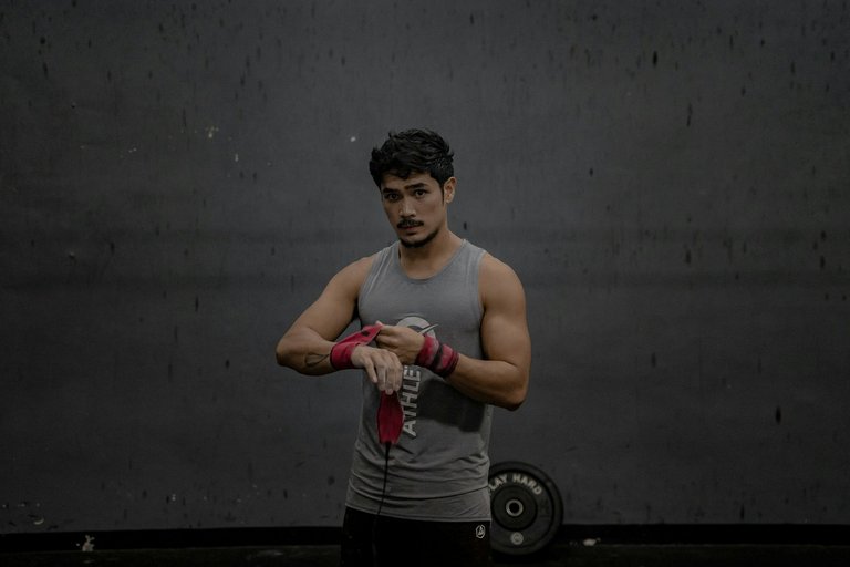 [Source](https://unsplash.com/photos/man-standing-wearing-gray-tank-top-f5WygrbMAkw)