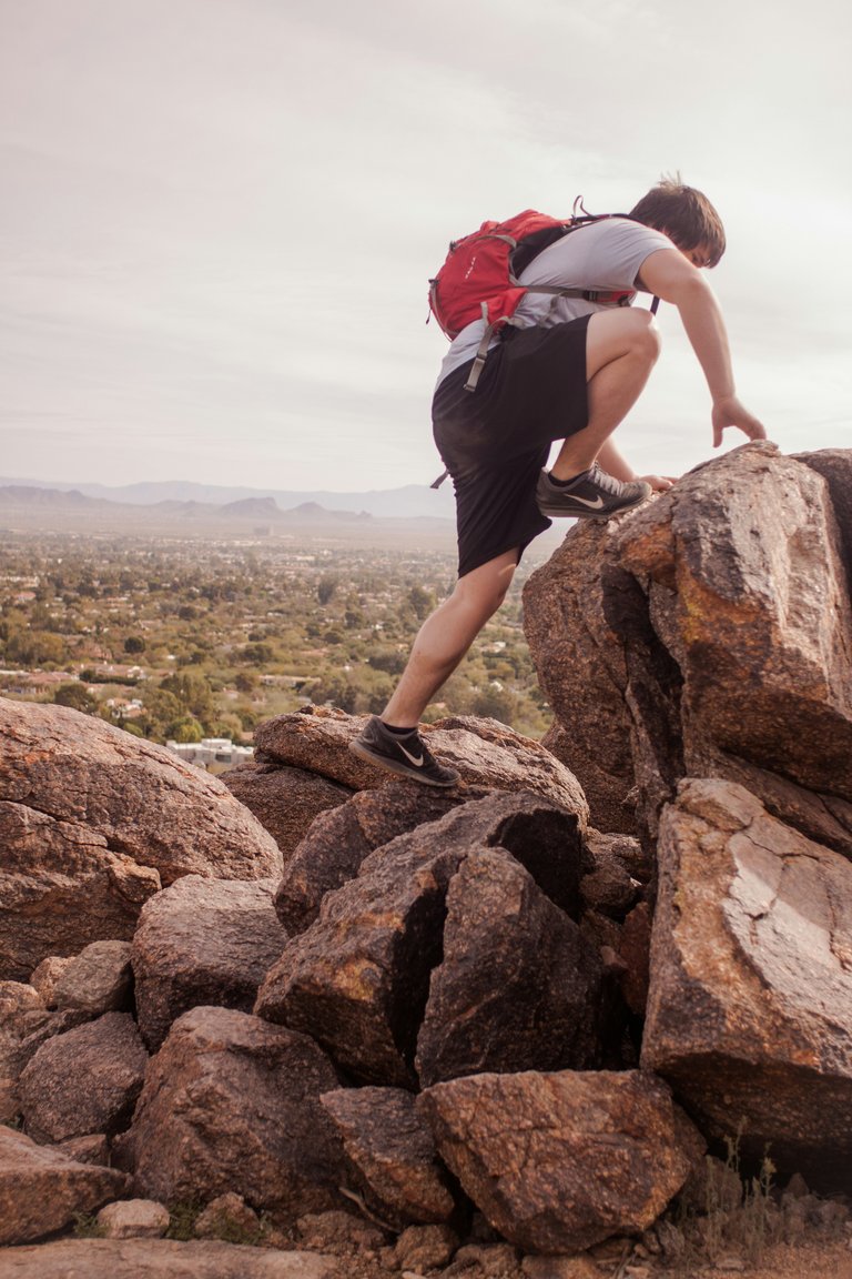 [Source](https://unsplash.com/photos/man-climbing-mountain-7oL1PR6AV8o)