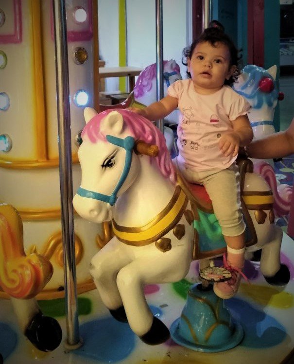 My daughter on the carousel