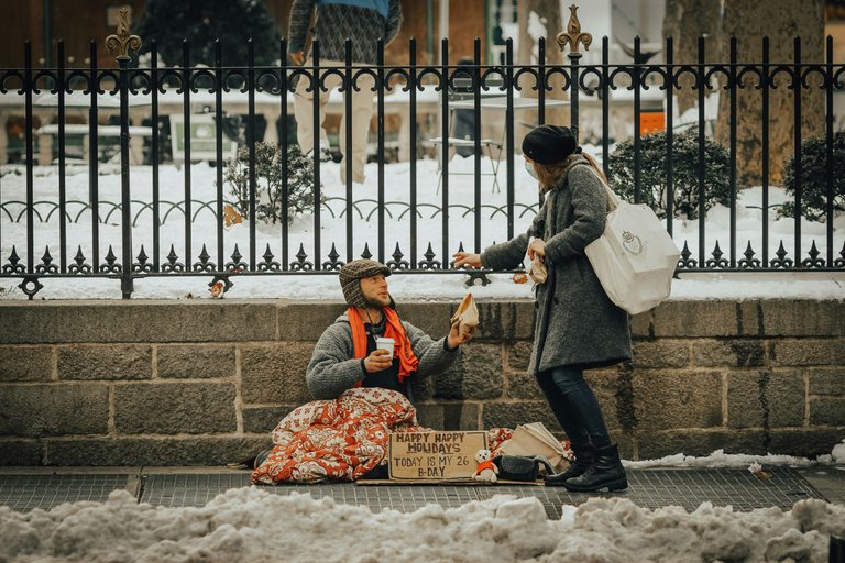 [source](https://unsplash.com/photos/man-in-black-jacket-and-black-pants-sitting-on-white-snow-covered-ground-during-daytime-rbz1hVh7_LM)
