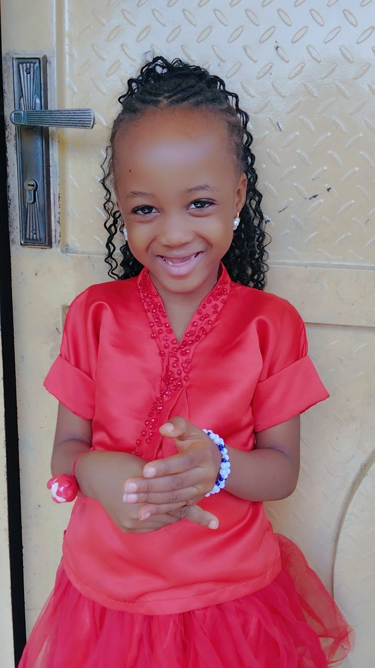 I made a red top to replaced an old white top for my daughter's Sunday wear.