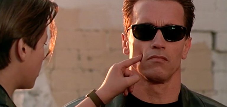 John Connor touching his protector's face (from TERMINATOR 2)