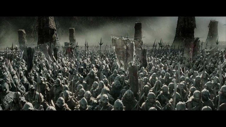 Orc army marching upon the gates representing the regulators coming at stablecoins.