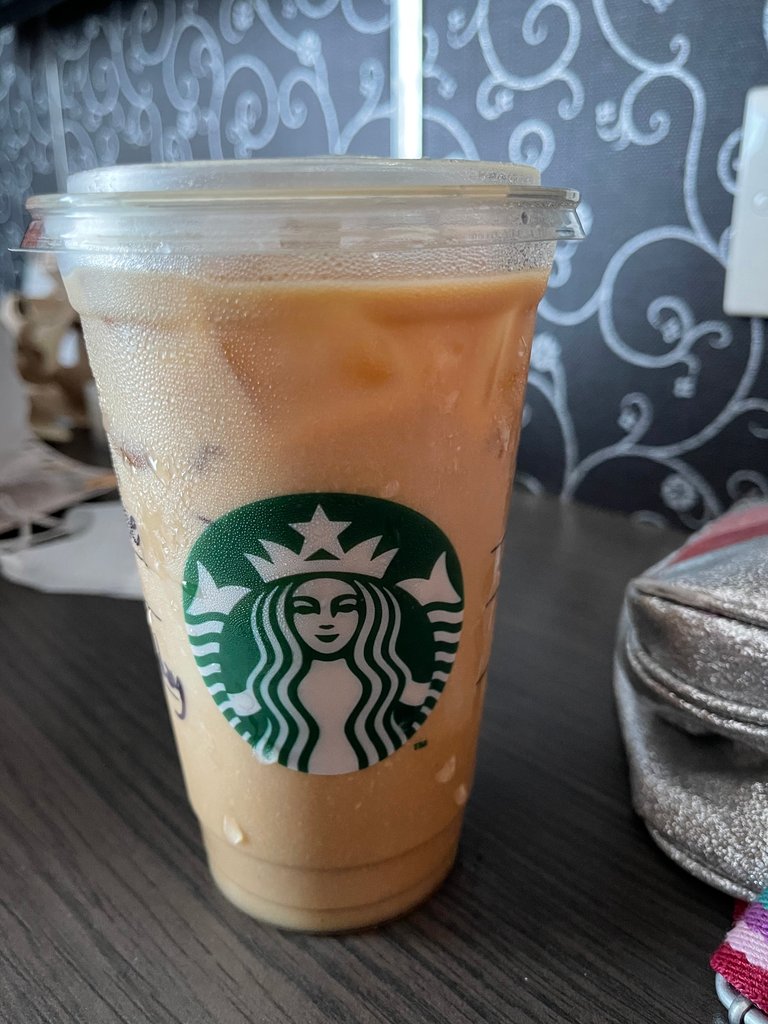 An Iced Hazelnut Latte with Almondmilk by Starbucks Medan