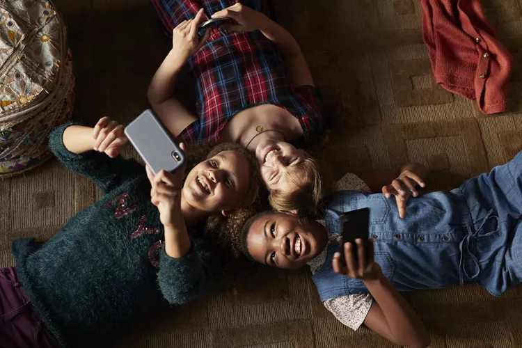 Caught Between Childhood and Screens: A Parent’s Guide to Phones and Social Media