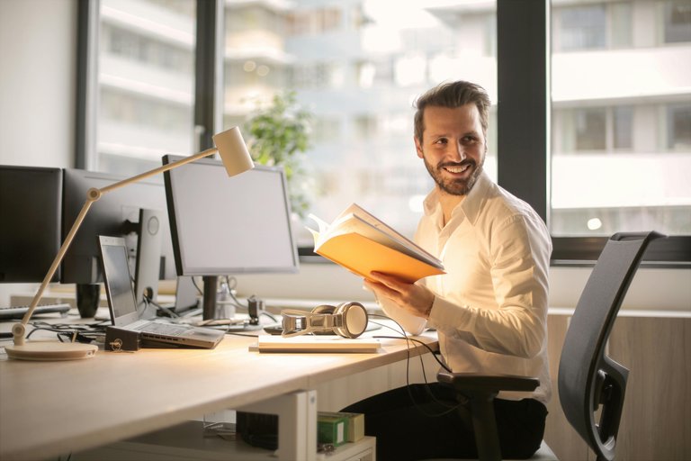 Man Holding a Book