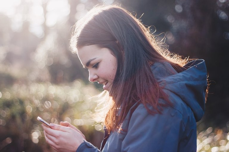 Karina with a phone