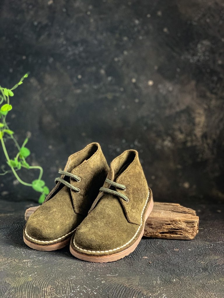 Suede shoes. Photo by Anastasia Malysh from Unsplash
