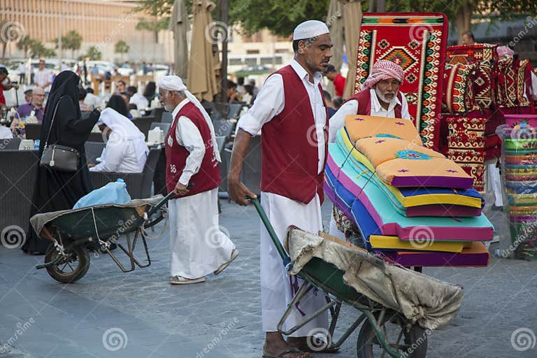 wheel-barrow-worker-market-souq-waqif-doha-qatar-doha-qatar-may-wheel-barrow-worker-market-souq-waqif-workers-used-212914648.jpg