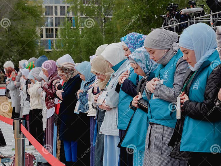 muslim-women-pray-namaz-stand-behind-red-ribbon-separately-men-kazan-russia-may-248128354.jpg