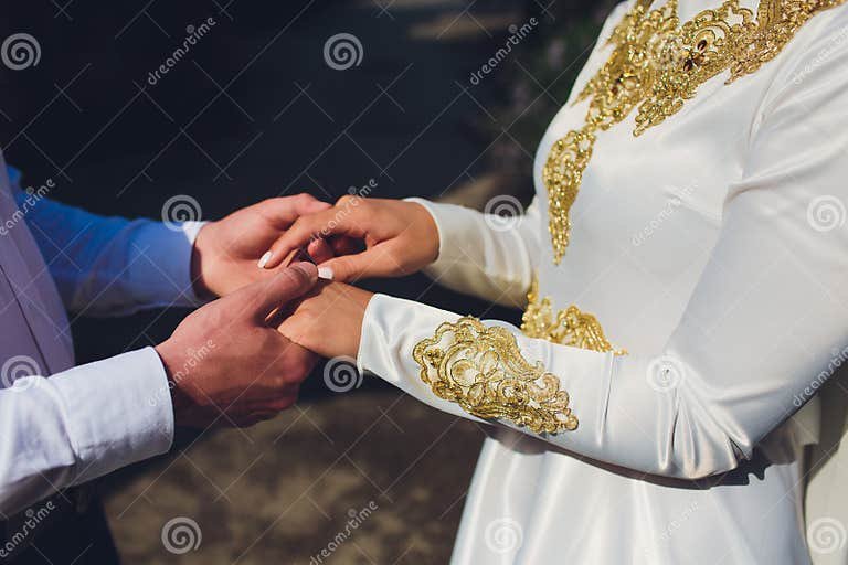 national-wedding-bride-groom-wedding-muslim-couple-marriage-ceremony-muslim-marriage-national-wedding-bride-168834441.jpg