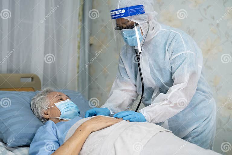 asian-doctor-wearing-face-shield-ppe-suit-new-normal-to-check-patient-protect-safety-infection-covid-coronavirus-outbreak-215247902.jpg