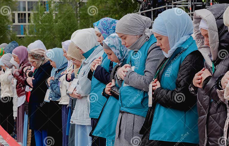 muslim-women-pray-namaz-stand-behind-red-ribbon-separately-men-kazan-russia-may-248128371.jpg