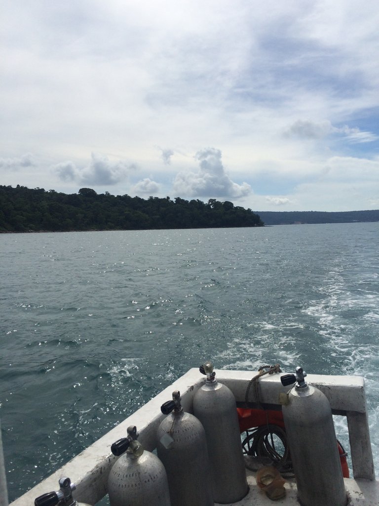 Tanks of air on the back of the boat.