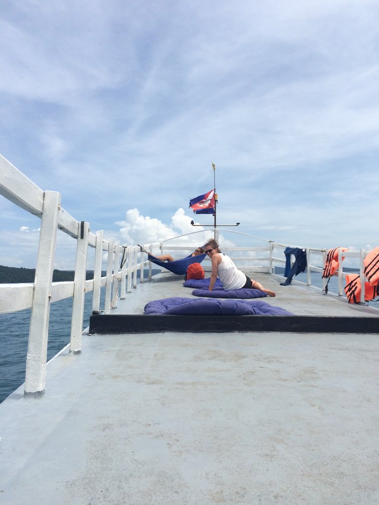 People waiting for the boat to arrive.