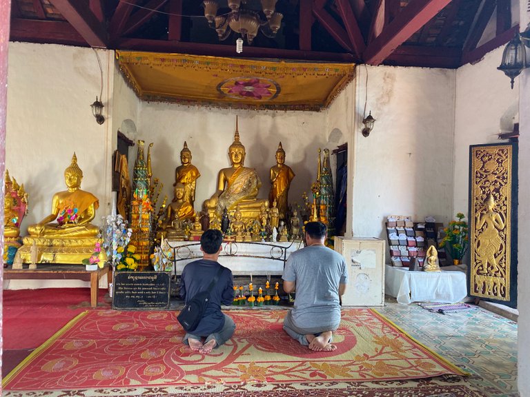 Locals praying. 