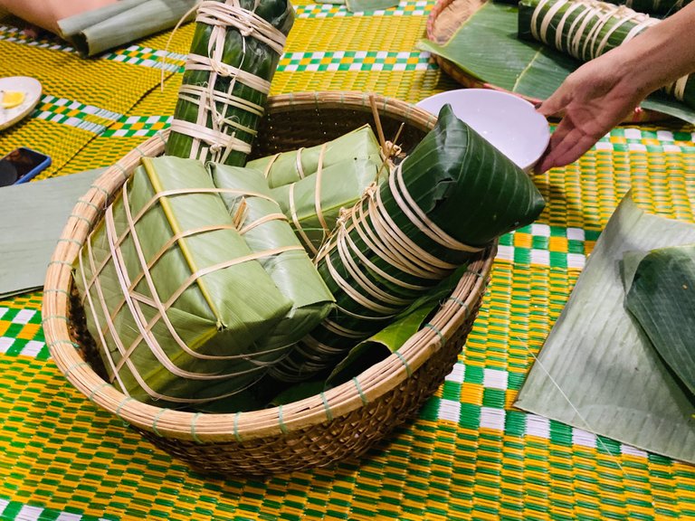 The square-shaped ones are called Banh Chung and the round ones are called Banh Tet. 