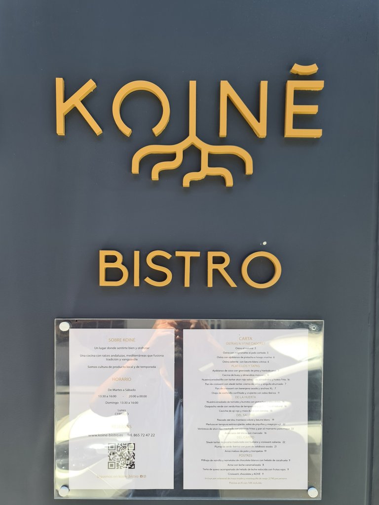 Logo and menu on the facade.