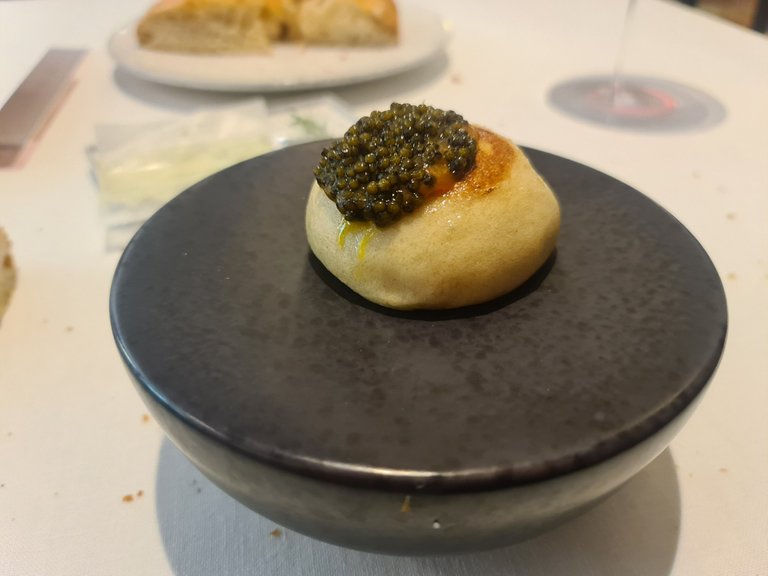 Steamed bun stuffed with eel and topped with black lemon meniere and caviar (Fifht main course) (2).