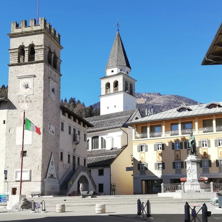 main square of the town with a statue of Tiziano