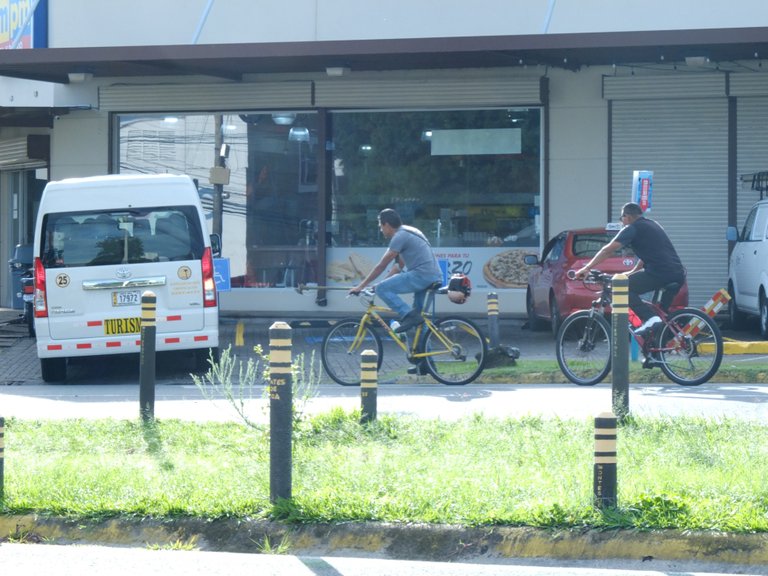 Micro business of some creative guy - bicycle and a brush cutter.