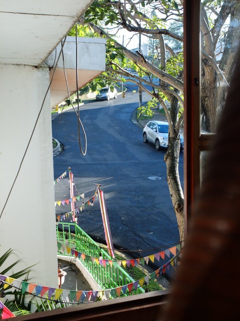 Cozy enclosed balcony of the Tripon Hostel.