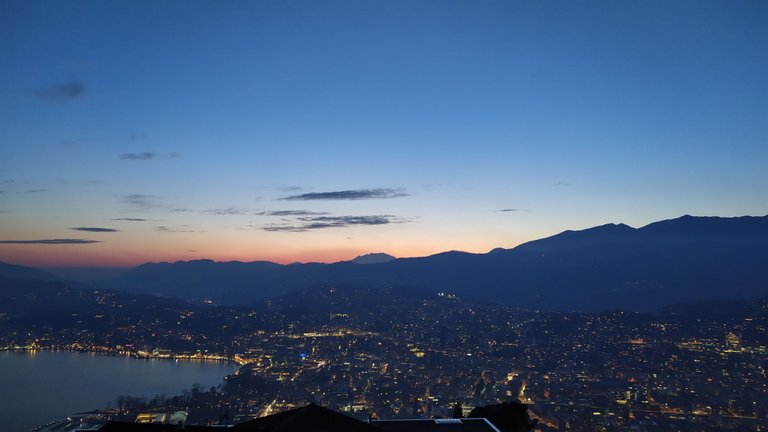 The shore of glacial Lake Lugano meets it’s town.